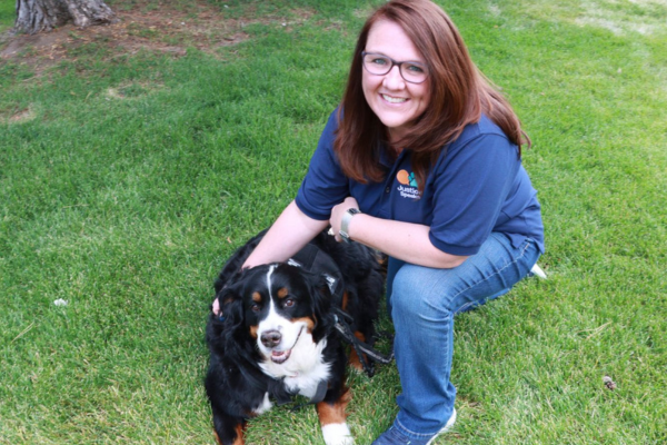 Cathy and her service dog Justice